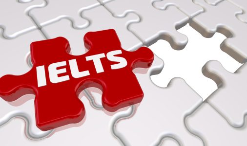 Folded white puzzles elements and one red with word IELTS. 3D Illustration